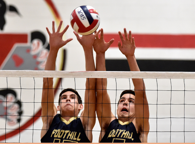 Foothill’s Branson Diaz, left, and Ryen Feldman block a shot against Las Vegas during ...