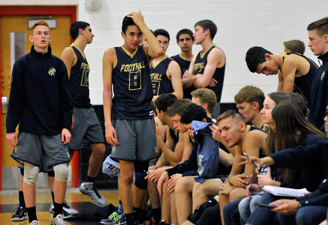 Players on the Foothill bench react after losing to Las Vegas during the Sunrise Region boys ...