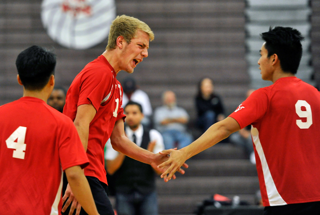 Las Vegas’s Brandon Kampshoff, center, reacts with teammates Kenneth Buen (4) and Mich ...