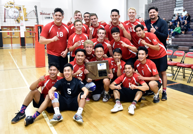 Las Vegas’s volleyball team poses with the championship trophy after the Sunrise Regio ...