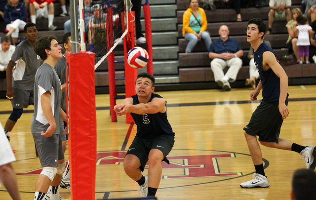 Legacy’s Braden Liu (5) passes the ballduring a Sunset Region boys volleyball semifina ...