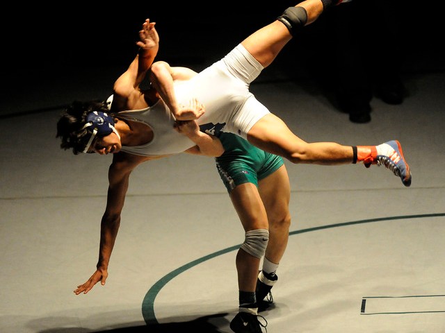 Green Valley’s Sean Cannon slams Liberty’s Michael Martinez to the mat during th ...