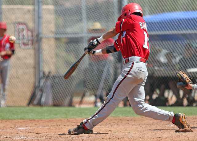 Arbor View’s R.J. Rodriguez hits the ball during the Division I Sunset Region high sch ...