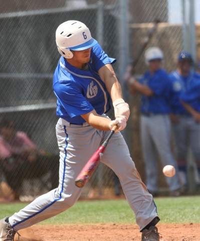 Bishop Gorman’s Grant Robbins lines up a hit during the Division I Sunset Region high ...