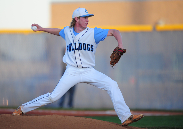 Centennial starting pitcher Jake Rogers delivers to Cimarron-Memorial in the first inning of ...