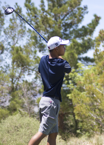 Liberty’s Rayrick Cadelina hits his ball during the Sunrise Region boys golf tournamen ...