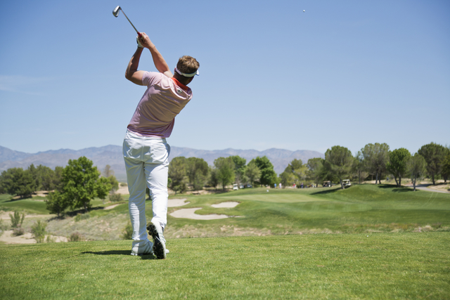 Bishop Gorman’s Christian James hits his ball during the Sunset Region boys golf tourn ...