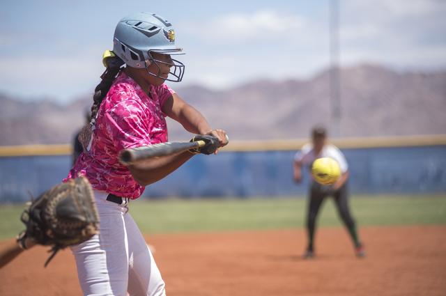 Foothill’s Jasmine Dukes (77) hits the ball against Rancho during their Sunrise Region ...