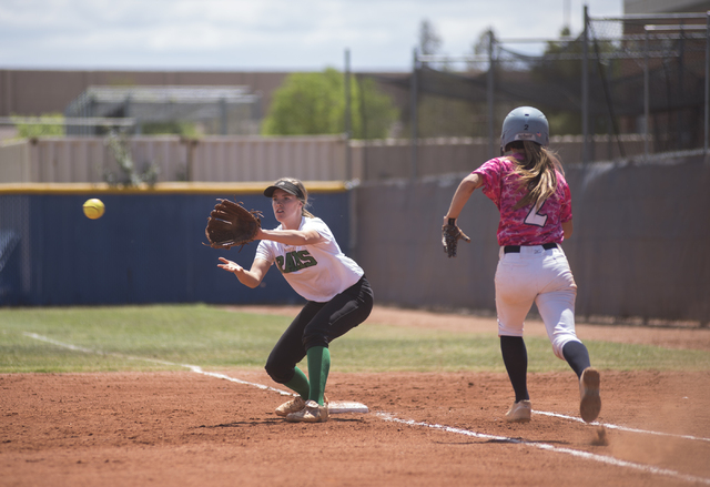 Rancho’s Samantha Pochop (72) catches the ball for an out at first against Foothill&#8 ...