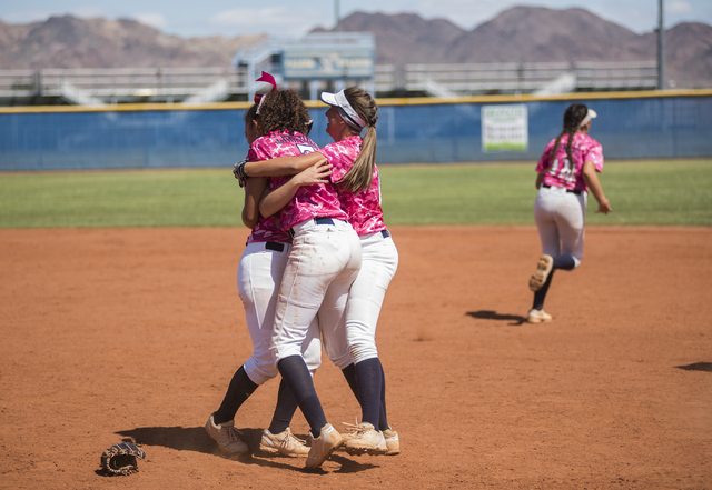 Foothill teammates embrace each other after beating Rancho during their Sunrise Regional fin ...