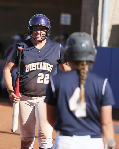 Shadow Ridge’s Kate Dennis, left, smiles to teammate Sofia Meza, right, after scoring ...