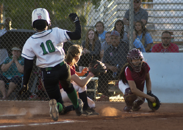 Rancho’s Jahnae Davis-Houston (10) slides into home plate scoring the only run of the ...