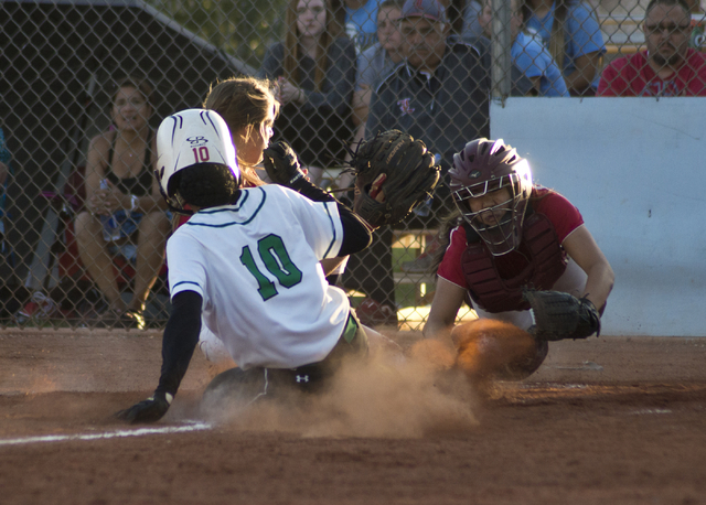 Rancho’s Jahnae Davis-Houston (10) slides into home plate scoring the only run of the ...