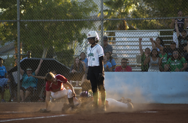 Rancho’s Jahnae Davis-Houston (10) stands on home plate after scoring the only run of ...