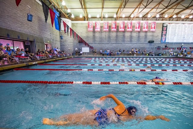 Swimmers compete during the Sunrise Region high school swim meet at the Bucky Buchanan Natat ...