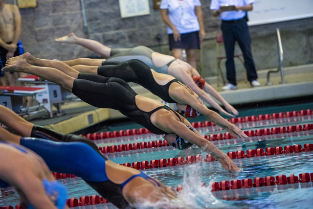 Swimmers compete during the Sunrise Region high school swim meet at the Bucky Buchanan Natat ...