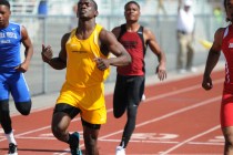 Bonanza’s Jayveon Taylor, center, competes in the 100-meter dash at the Sunset Region ...