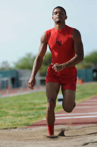 Las Vegas Jerome Ewing competes in the boys triple jump at the Sunrise Region meet on Saturd ...