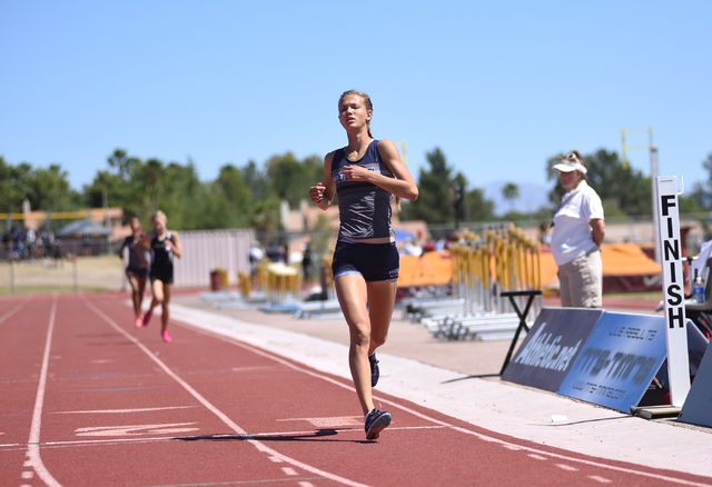 Centennial’s Karina Haymore finishes in first place after competing in the girls 1600 ...