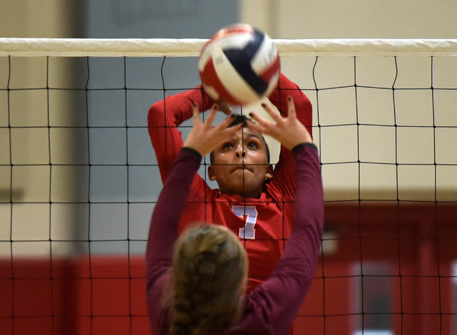 Western’s Jannessa Dunton goes up to block the ball against Pahrump Valley during a hi ...