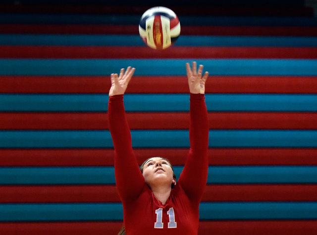 Western’s Nikki Riggs sets the ball against Pahrump Valley during a high school volley ...