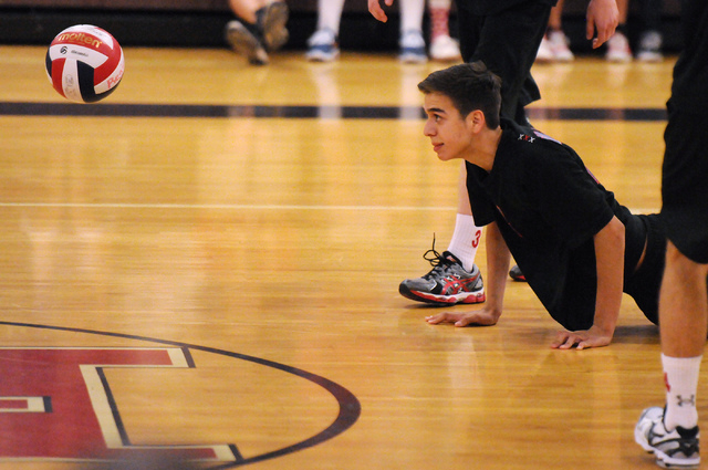 Valley’s Alex Sandoval (4) is late to save a ball during the Sunrise Region boys volle ...