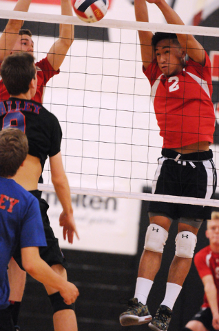 Las Vegas’ Chris Marx (8) and T.J. Esporas (2) team for a block in the Sunrise Region ...