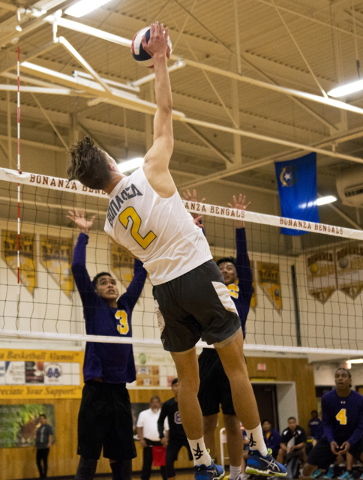 Bonanza’s Robby Adair (2) hits the ball during the Sunset Region boys volleyball quart ...