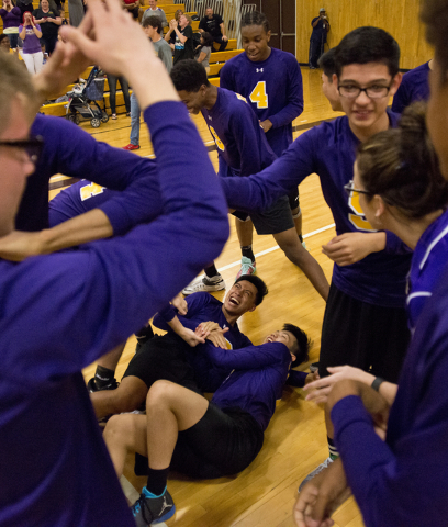 The Durango boys volleyball team celebrates after winning the Sunset Region boys volleyball ...