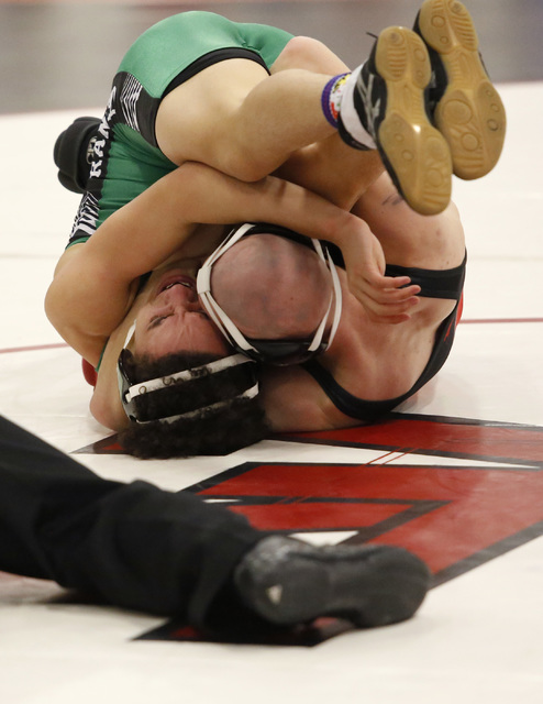 Las Vegas’s Daniel Law, right, attempts to pin Eldorado’s Isac Rubio during a 13 ...