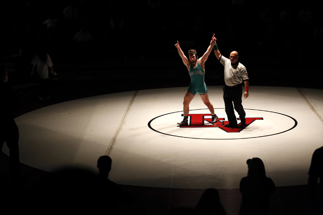 Green Valley’s Cody Chamblerlin reacts after winning an overtime 152 pounder match at ...