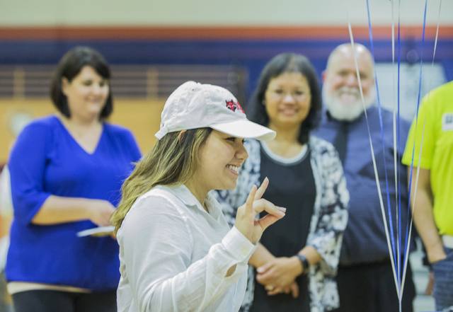 Bishop Gorman’s Leah Glaser poses for a photo with parents Joshua and Irene Glaser at ...