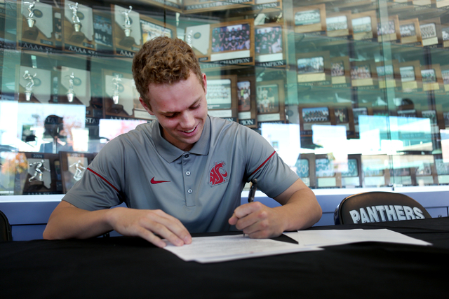 Palo Verde senior Dylan Orlando signs his paperwork for playing baseball at Washington State ...