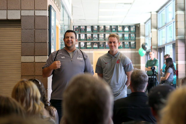 Palo Verde senior Dylan Orlando coach is celebrated by his baseball coach Joe Hallead at Pal ...