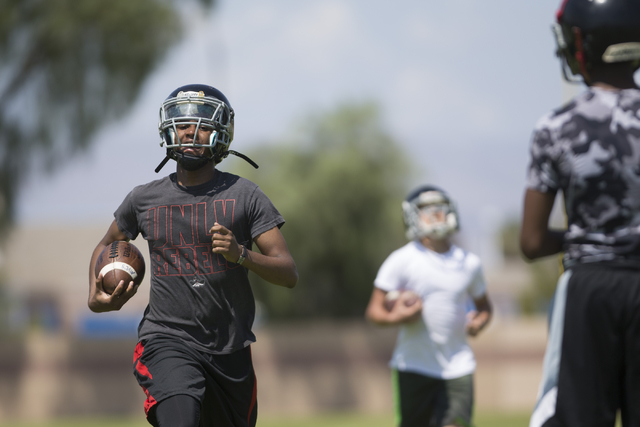 Tyrell Brooks runs sprints during a team football practice at Mountain View Christian High S ...