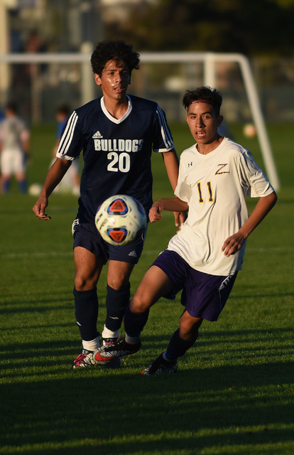 Durango’s Christopher Bramasco (11) battles for the ball against Centennial’s Je ...