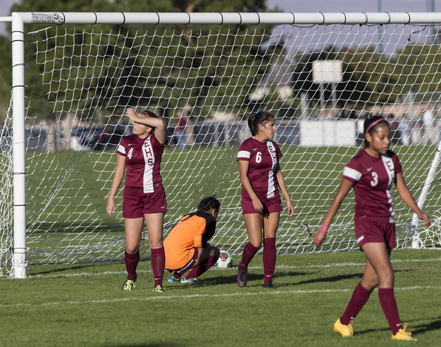 Eldorado goalie Dina Goc’ Ong (8) and teammates react after Foothills scores their thi ...