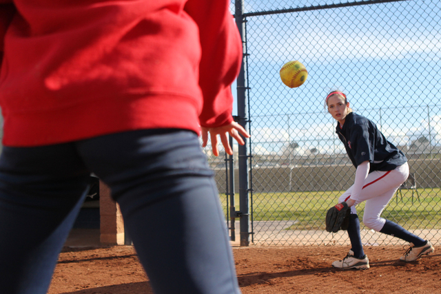 Sarah Pinkston, 16, pitcher for Coronado’s varsity softball team, gets ready to catch ...