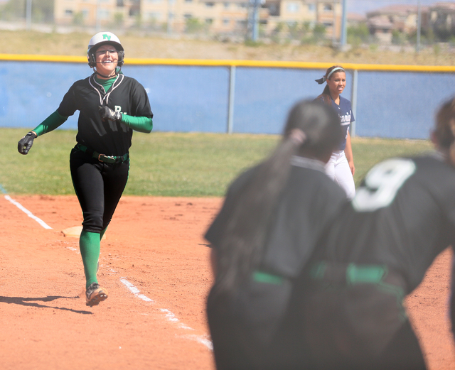 Palo Verde’s Rachel Williams runs to home plate after hitting a home run against Cente ...