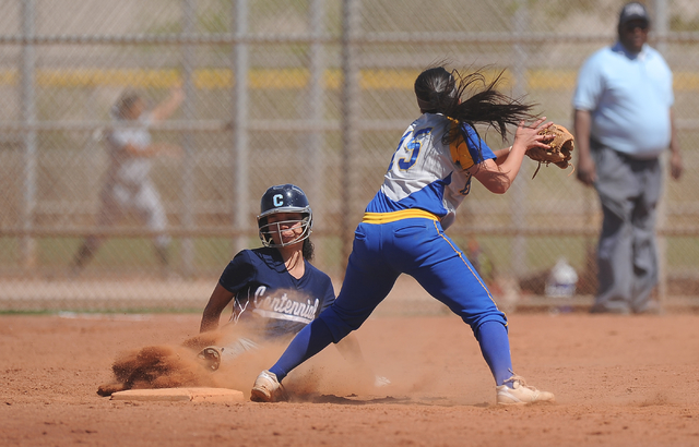 Centennial base runner Angel Love steals second base as Brawley (Calif.) shortstop Hannah Ro ...