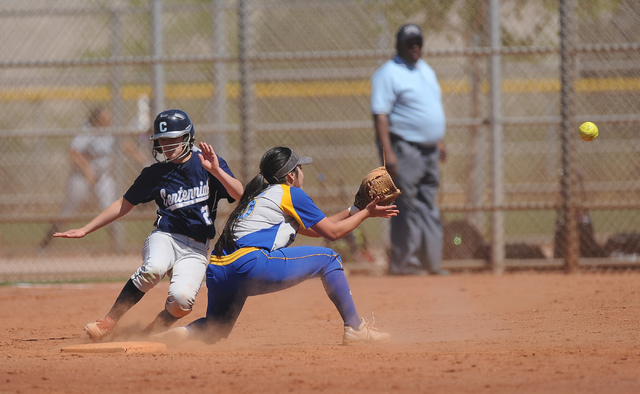 Brawley (Calif.) shortstop Hannah Rodriguez prepares to tag out Centennial base runner Skyle ...