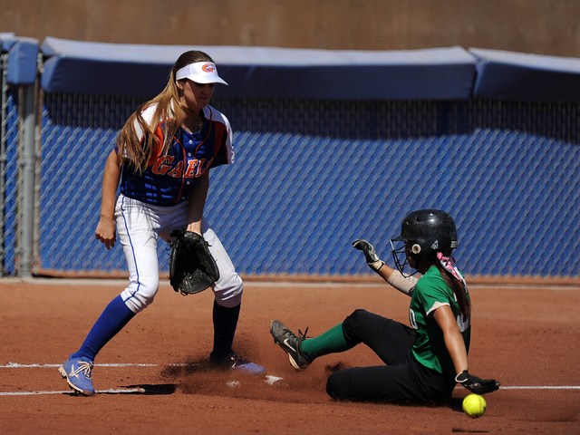 Rancho base runner Katerina Anthony safely advances to third base on a Rancho base hit as Bi ...