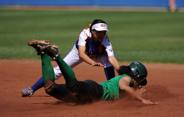 Bishop Gorman shortstop Sierra Dias tags out Rancho base runner Kayla Coles after Coles atte ...