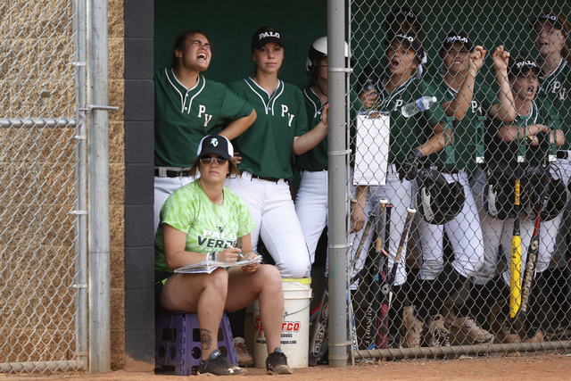 Palo Verde’s players cheer their teammate on bat in their softball game against Rancho ...