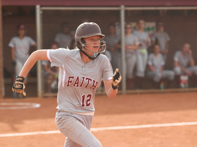 Faith Lutheran’s Briana Hemphill (12) runs for first base against Boulder City on Thur ...