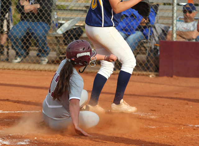 Faith Lutheran’s Erin Gilchrist slides into home against Boulder City on Thursday. Fai ...