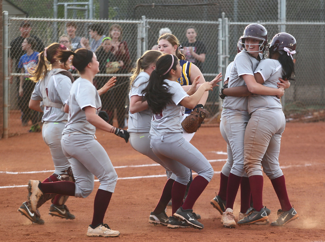 Faith Lutheran players celebrate their 6-5 win over Boulder City on Thursday. (Chase Stevens ...