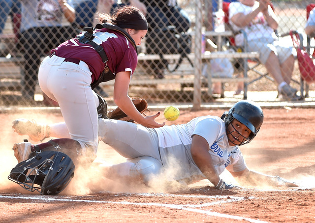 Sierra Vista’s Kira Felise slides safely home as Faith Lutheran catcher Claire Peck dr ...