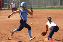 Foothill’s Hannah Stevens legs out a single ahead of the throw to Liberty first baseman Ky ...