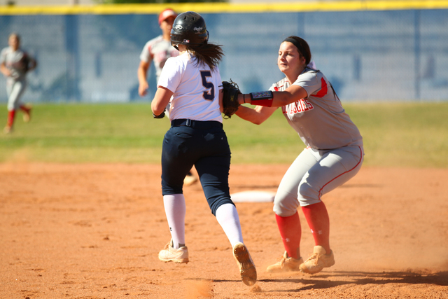 Arbor View’s Kellie Anderson tags out Shadow Ridge’s Samantha Milanovich (5) to ...